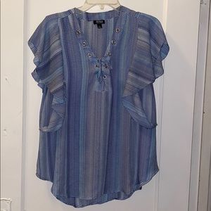 Various shades of blue a.n.a top.